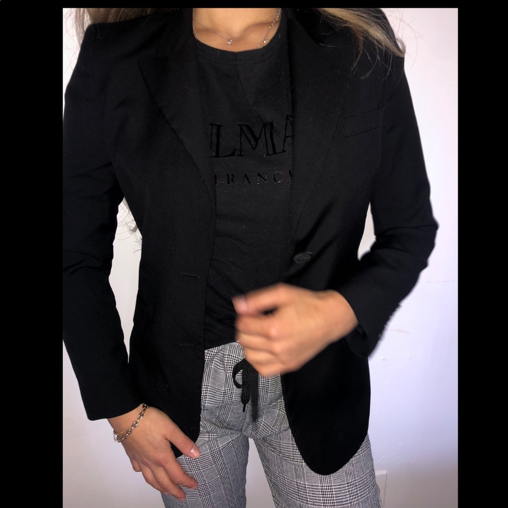 Gucci blazer uniform.